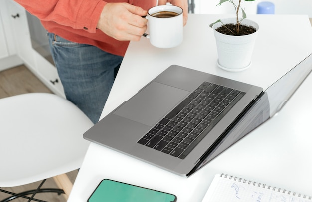 Man working on laptop in home office