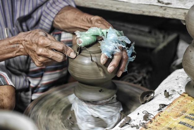 man working on mud