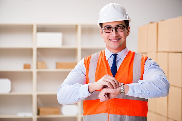 Man working in postal parcel delivery service office