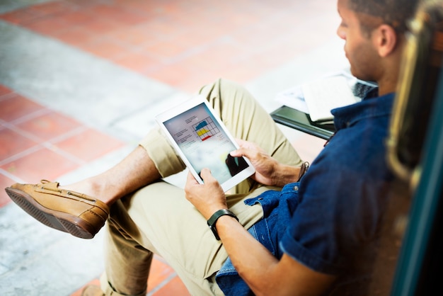 A man working on a tablet