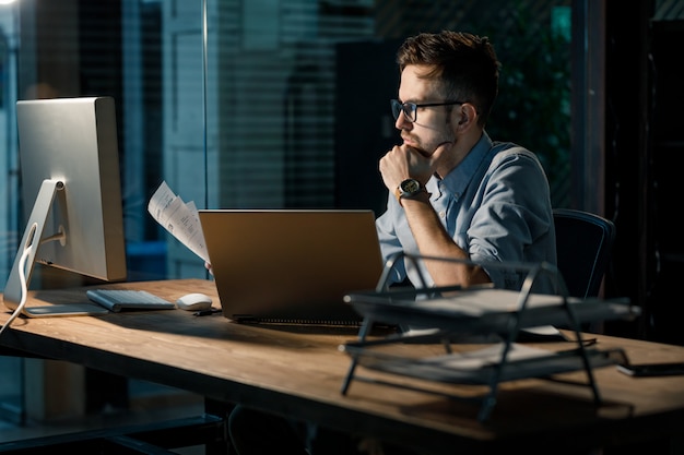 Man working with documents in office