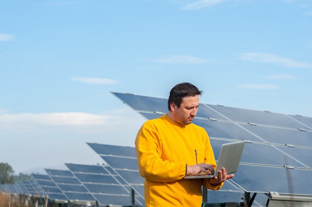 Man working with solar panels 