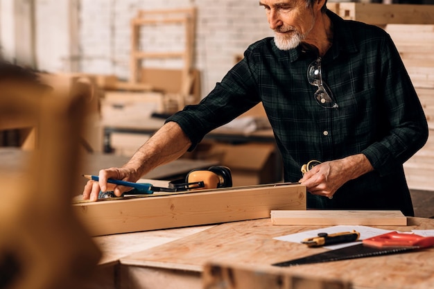 man working on wood