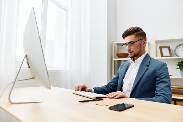 Manager at the desk in the office an official isolated\
background