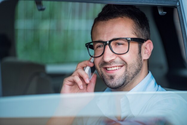 Manager driving in a car