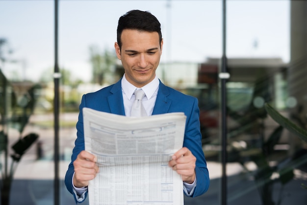 Manager reading the newspaper