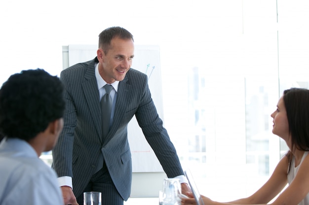 Manager talking to his team in a presentation