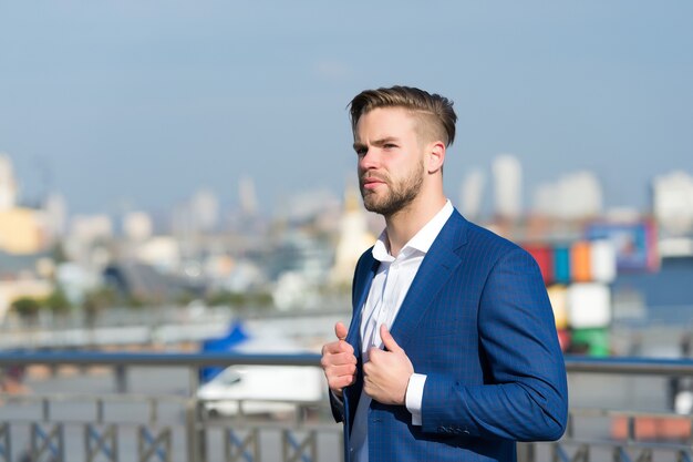 Manager with beard on serious face. Business and success. Modern life and agile business. Man in formal outfit outdoor. Businessman or ceo urban fashion.