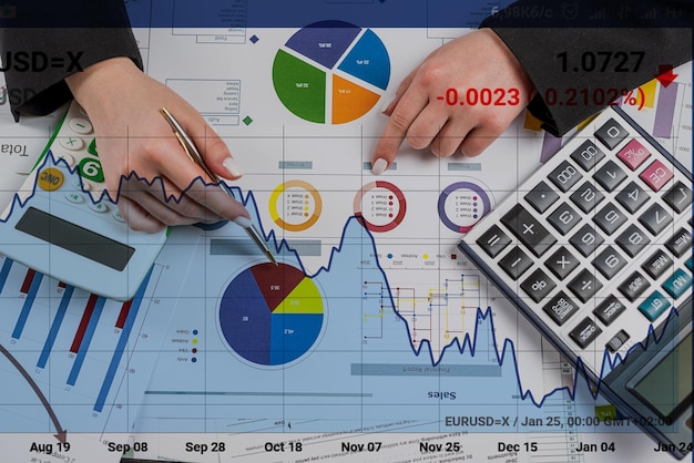 Manager working with finance charts graph and doing annual analytic research document at office