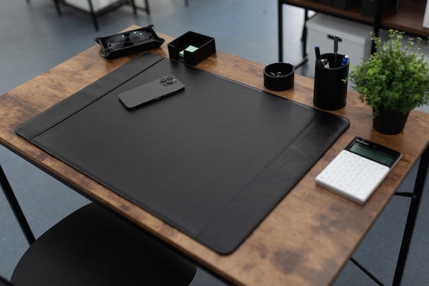 Managers desk with leather pad and stationery accessories