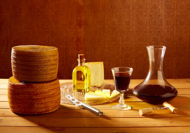 Manchego cheese from Spain on wooden table