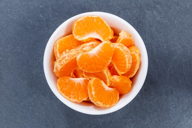Mandarijntjes fruit van boven kom leisteen