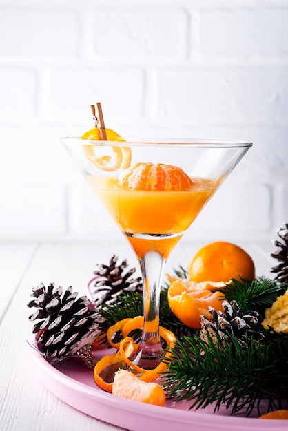 Mandarin martini in a glass of New Year