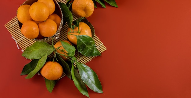 Mandarin orange with green leaves