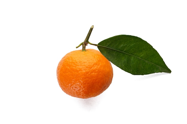 Mandarin with green leaf isolated on white