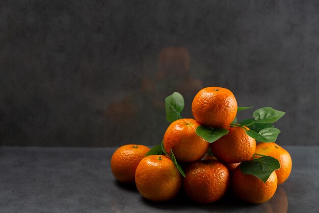 Mandarins on dark background