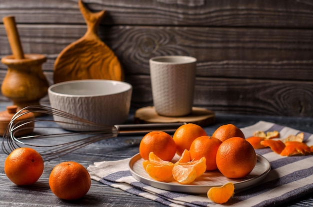 Mandarins in the skin and brushed on the plate Kitchen Cooking food  Kitchen background