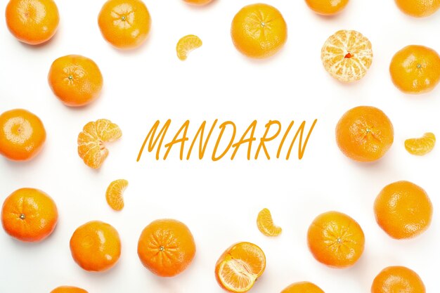 Mandarins and text mandarin on white background