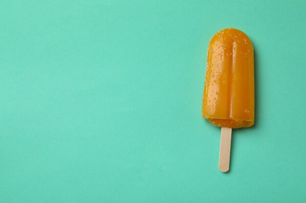 Mango or caramel ice cream stick on mint