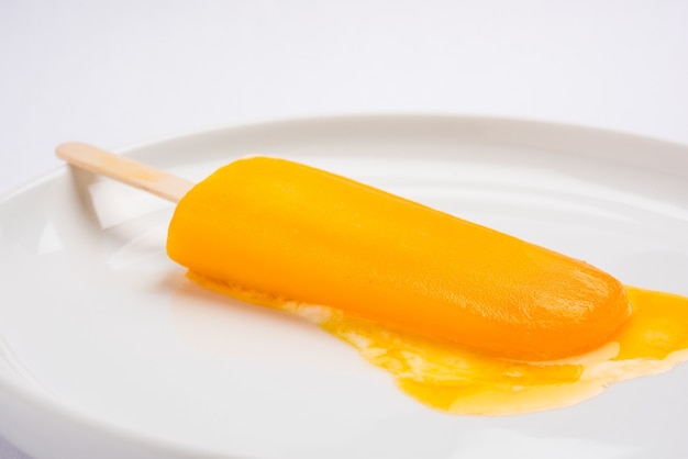 Mango flavoured ice candy or ice bar or kulfi, made up of sweet and tasty alphonso or hapoos Aam