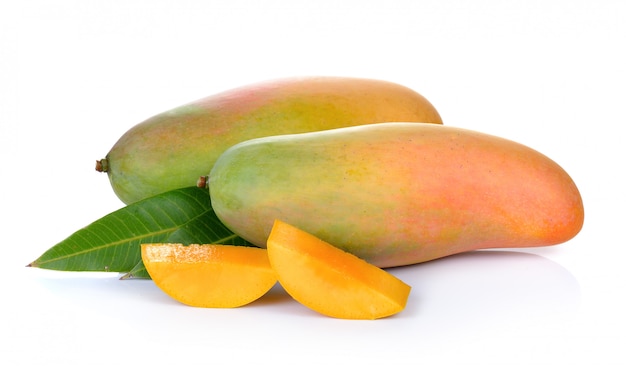 Mango fruit with leaves isolated on white