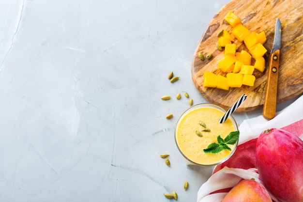 Mango lassi indian drink smoothie beverage with yogurt