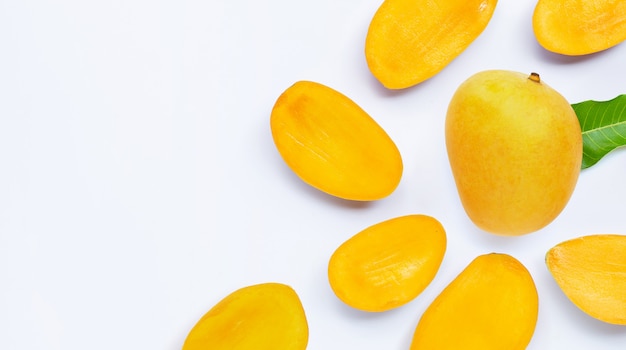 Mango slices on a bright background