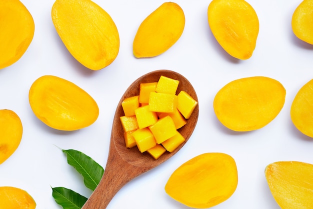 Mango slices on a bright background