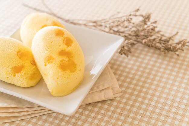 mango soft cake on wood