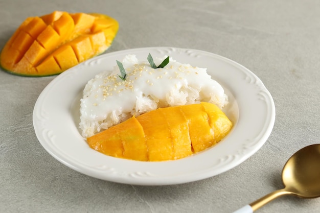 mango with sticky rice is a typical Thai dessert made from glutinous rice and coconut milk sauce.