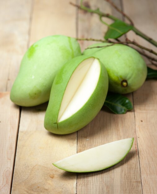 Mango on wood background