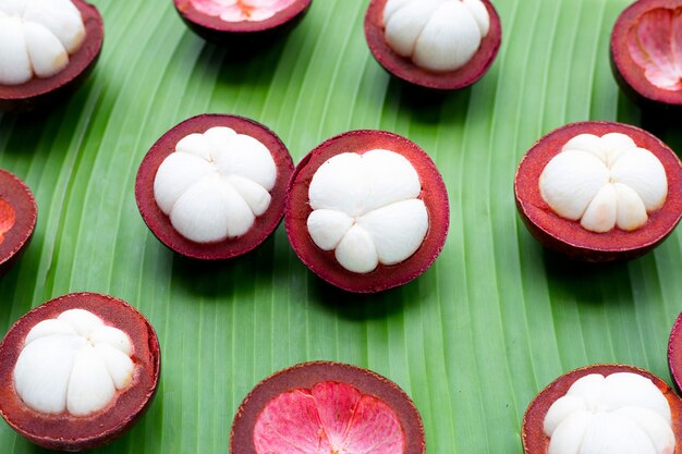 Mangosteen fruit on banana leaf