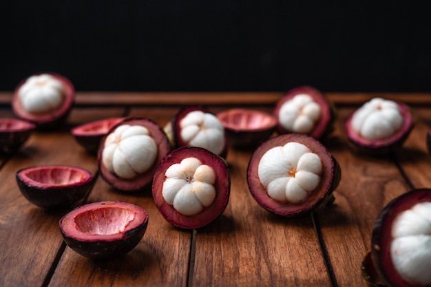 Mangosteen fruit on wooden background,summer fruit