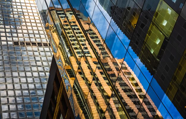 Manhattan in New York City. Modern skyscrapers and streets of NYC. City and street view with big buildings