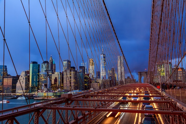 Manhattan skyline from the Brooklyn bridge at dusk