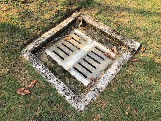 Manhole stone drain cover at the public park