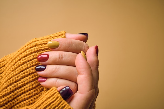 Manicure in autumn colors, nail design.