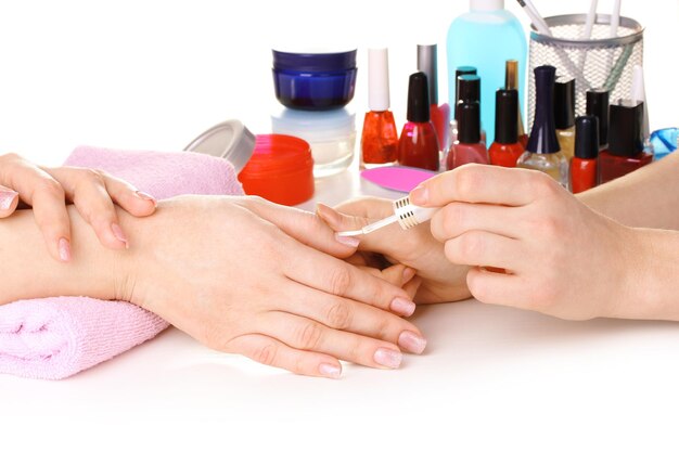 Photo manicure process in beautiful salon