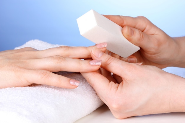 Manicure process in salon