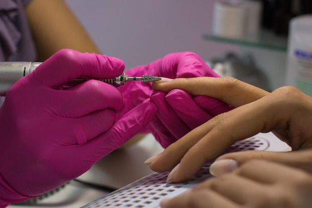 Manicure process in salon