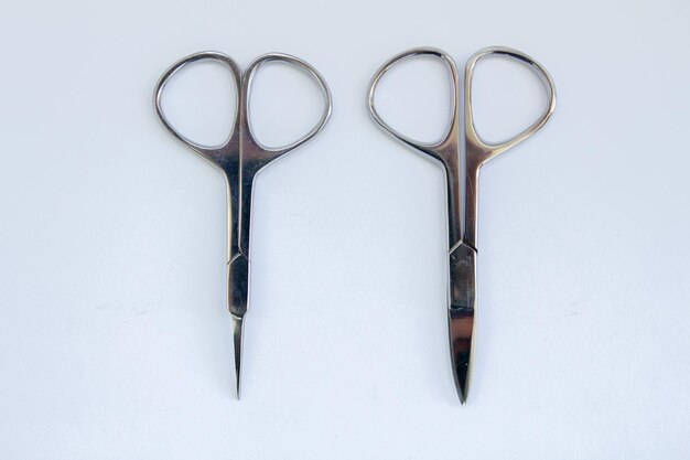 Manicure scissors on a white background