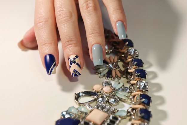 Manicure with blue nail polish