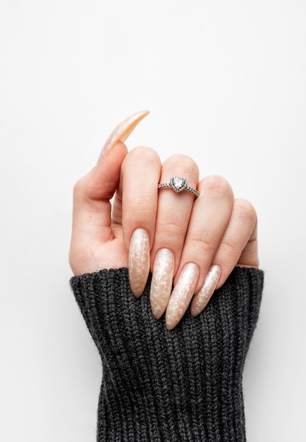 Photo manicured nails with pearlescent nail polish