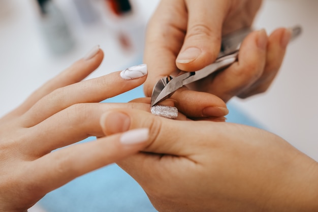 Manicurist does manicure