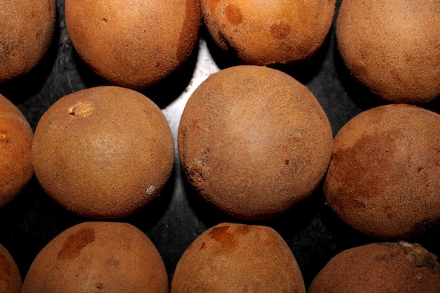 Manilkara Zapota Fruits with Black Background