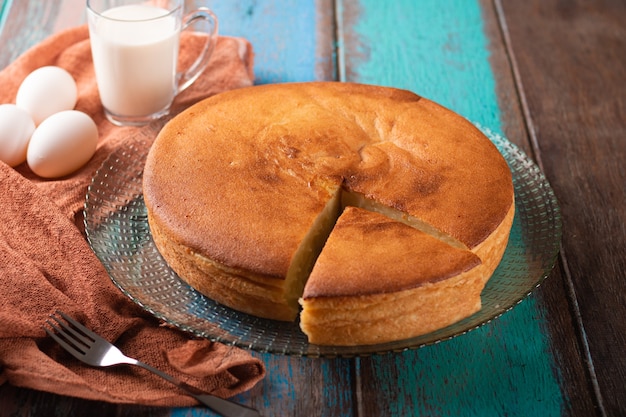 Manioc cake with rustic wood background.