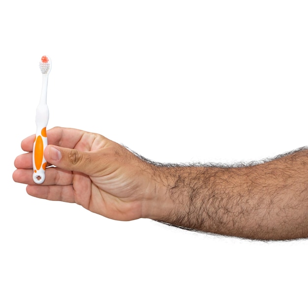 mannelijke hand geïsoleerd op een witte achtergrond met een tandenborstel
