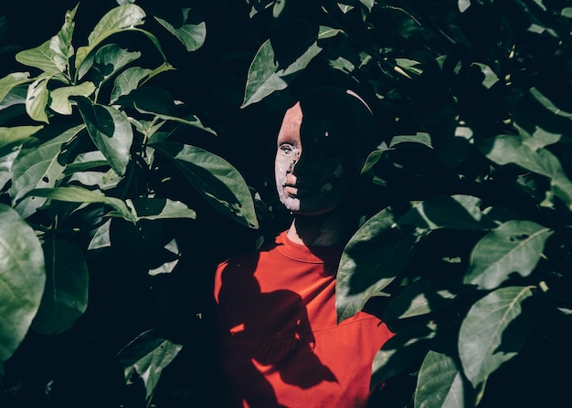 mannequin by plants