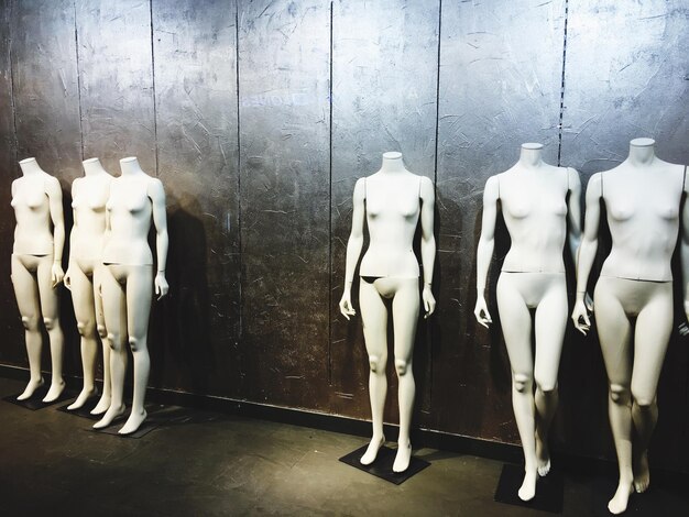 Photo mannequins against wall