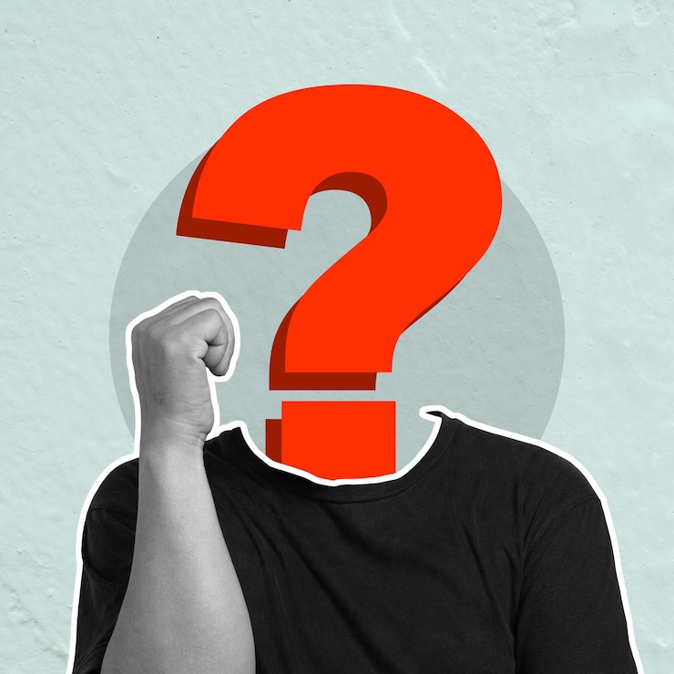 Photo a mans face is covered in a red question mark